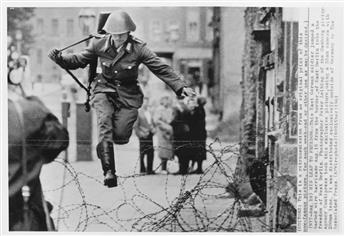 (THE BERLIN WALL--EAST & WEST GERMANY) A group of 50 press photographs, with 20 relating to the Berlin Wall and 30 depicting daily life